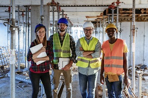 construction workers smiling at camera